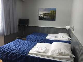 Отель Hotel Kainuu Кухмо Стандартный двухместный номер с 2 отдельными кроватями-9